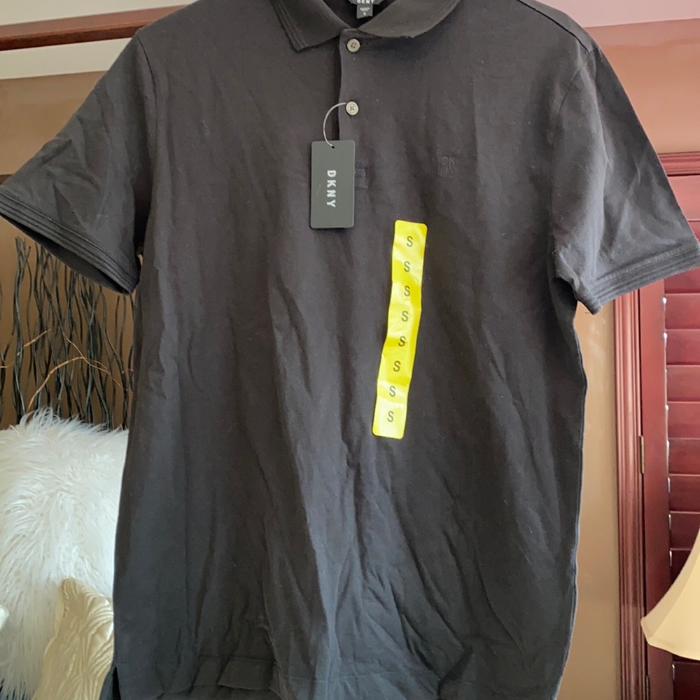 DKNY NWT young men’s black polo shirt.